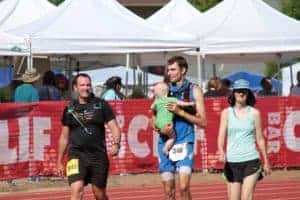 Coach Andrew Taylor, Nicole, Samuel, and pacer Josh finishing the Western States 100