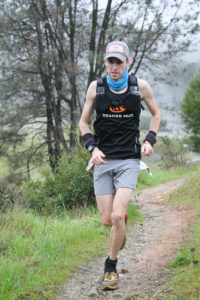 Andrew Taylor running in FOURmidable 50K, photo by Captivating Sports Photos