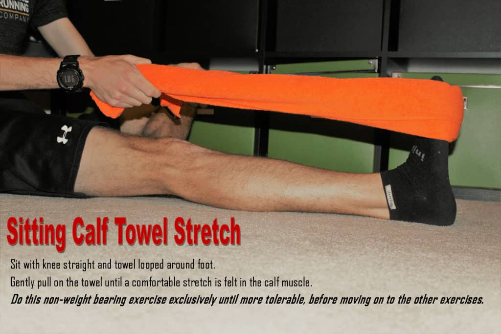 Sitting calf towel stretch illustration