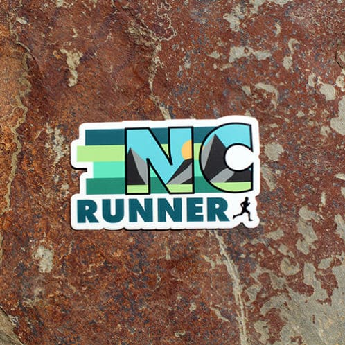 North Carolina Running sticker on rock background