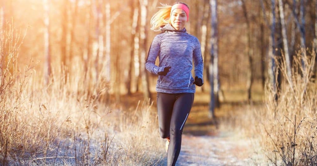 Female runner enjoying running in the winter