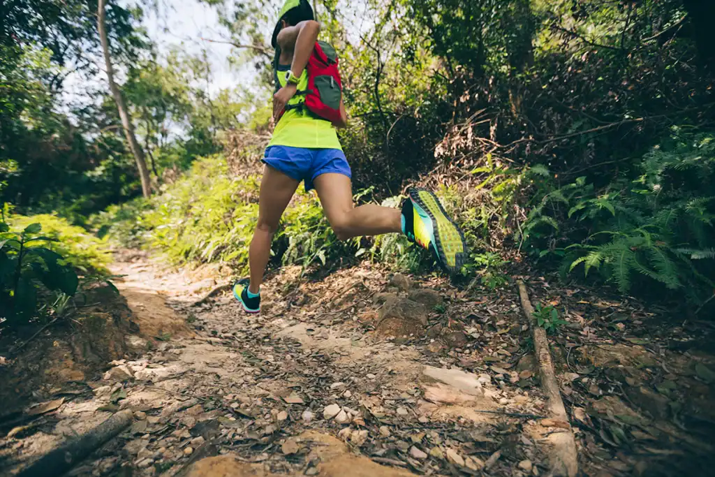 female runner during 50 mile ultramarathon training