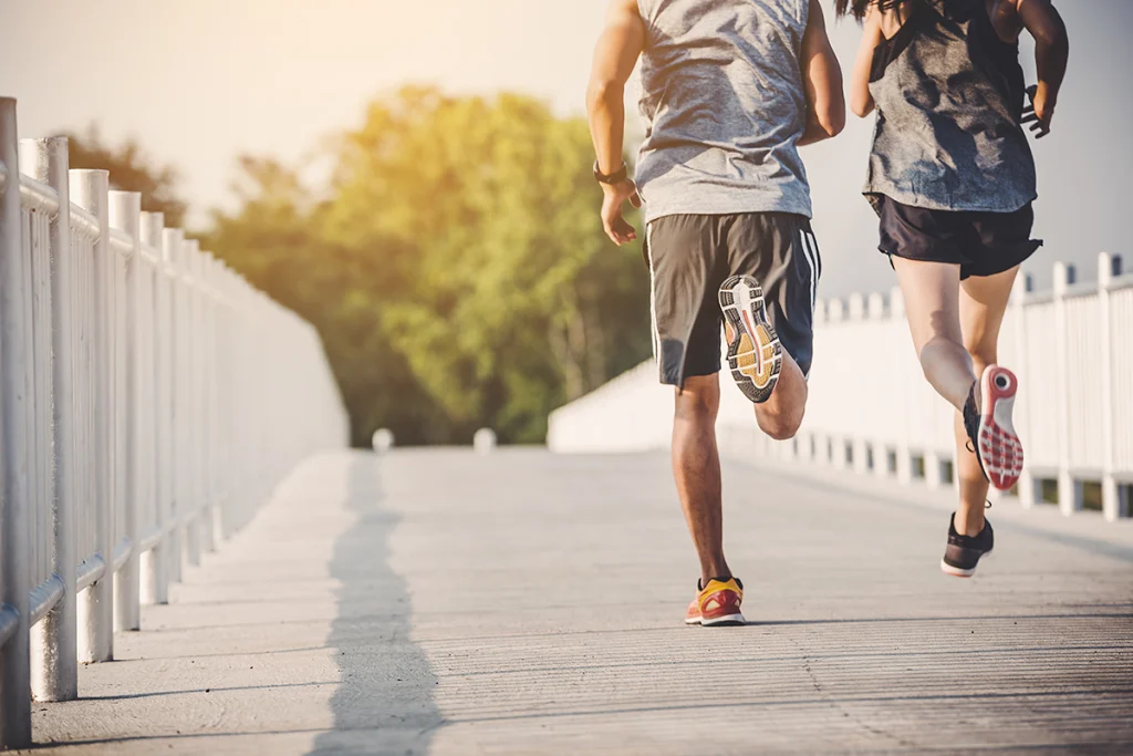 two runners completing a workout from their intermediate 10k training plan